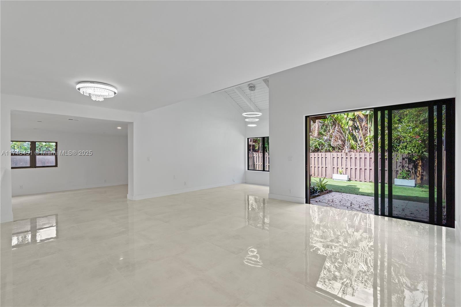 Here's the opportunity you have been waiting for! Fully remodeled oversized 3 bed - 2 bath townhome. This corner unit features italian porcelain throughout the entire unit, impact windows, italian cabinetry, brand new stainless steel appliances, quartz countertops and backsplashes, modern light fixtures, laundry, storage room & a side/back yard full of possibilities, located in the heart of the fabulous & super quiet Tamerlane Community, across the street from the community's club house with swimming pool, pic nic & sunbath area, pickleball, basketball, soccer and tennis courts! The community is in great standing with the city and complies with all its requirements. HOA is just $250 a month!! Call now to come see it!