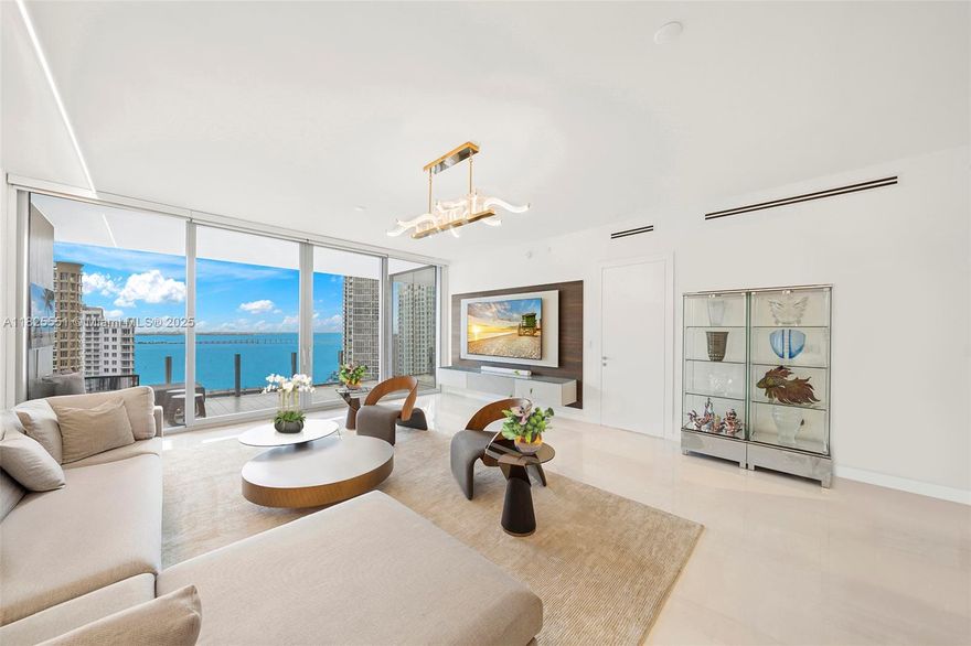 300 Biscayne Blvd Way #2703.  Lowest priced fully furnished flow-through Aston Martin spacious residence with 3 bedrooms, 4.5 baths; enlarged principal bedroom and guess bedroom; a convertible  Den/media room; staff quarter with bath and laundry area. Two parking spaces included. 
This residence boasts panoramic views of Biscayne Bay and the city skyline. The interiors feature  marble floors, Gaggenau appliances. It is  fully furnished, with built-in closets, motorized window treatments throughout, audio visual equipment and 6 T.V’s. 
Enjoy exclusive access to over 42,000 Sq. Ft. of impressive world-class amenities, including: Indoor and outdoor swimming pools, Two-story state-of-the-art fitness center; Full-service spa; Golf simulator; Art gallery; children’s lounge; and much more.