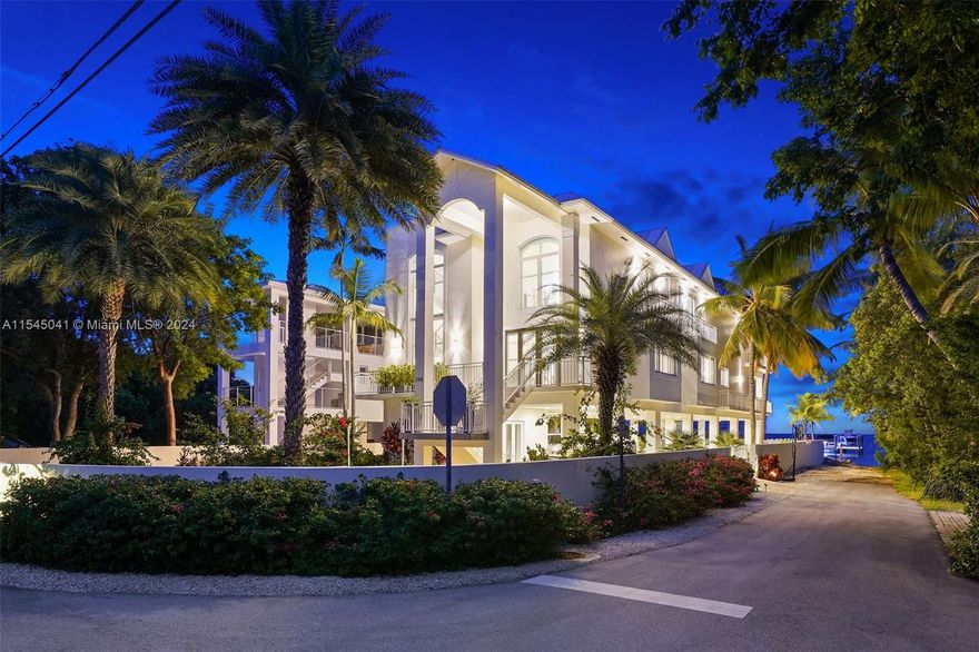Nestled in Tavernier & rebuilt in 2015, this 5 BD + 5.5 BA villa is turnkey ready & requires minimal upkeep. Designed for low maintenance & engineered to perfection: double seawall, a concrete roof, & living levels positioned 17 ft above sea level - providing unparalleled tranquility in all weather conditions & translating into reduced insurance costs. 

Situated on a 9,461 SF corner lot & encompassing 4,368 SF of living space, including a theater/media room & loft, enjoy 4 levels of usable SF, including a rooftop terrace w/ artificial turf & a putting green. 

4 of the 5 bedrooms are located upstairs, w/ the primary suite offering wall-to-wall ocean views. W/D are upstairs. Elevator access to levels 1-3. 191 ft dock equipped w/ boat slip & 17K boat lift. Controlled depth: 5 ft.