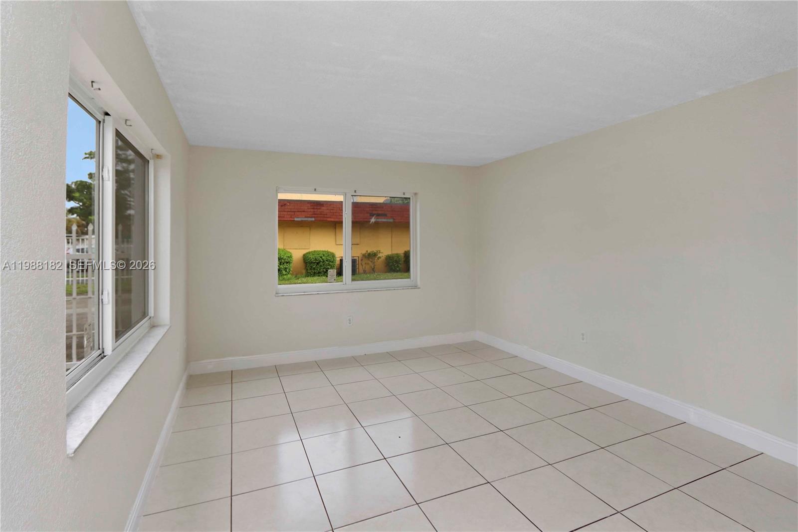 NEW WORLD CONDO APTS IV - Residential Lease