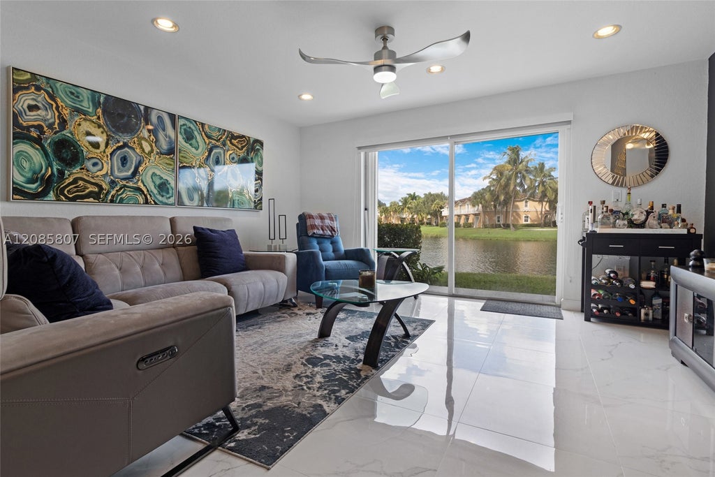 Photo of 12905 SW 31st Ct #TOWNHOUSE, Miramar, FL 33027 (MLS # A12085807)