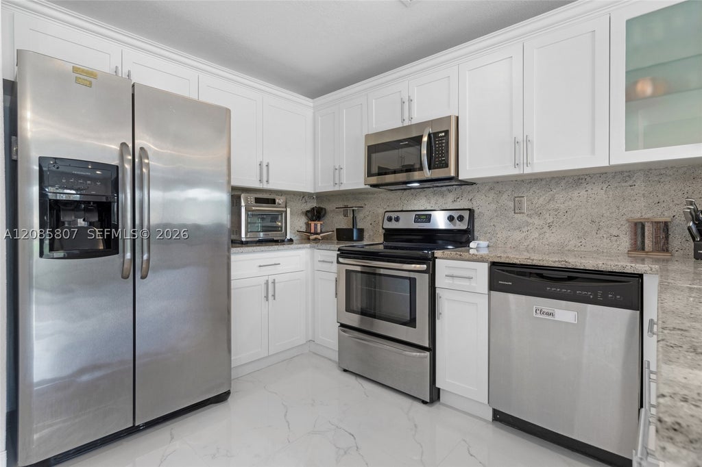 Photo of 12905 SW 31st Ct #TOWNHOUSE, Miramar, FL 33027 (MLS # A12085807)