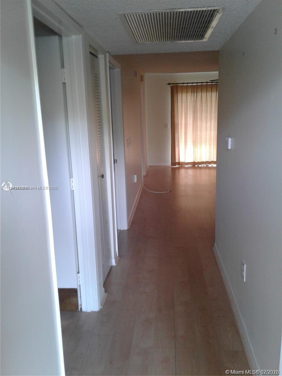 Downsizing or relocating from winters; this is a Great first floor Condo 2/1.5 Condo with WASHER/DRYER, Tile & Wood, Laminate floors thru out. SCREENED patio with impact glass! ENJOY ALL THE AMENITIES of luxury Resort style community for the active 55+. OFFERS Clubhouse with Movie Theater, Indoor & Outdoor Pools, 2 Health Clubs, Tennis, Golf, Billiards, Card tables, Shuffleboard, Library & Monthly scheduled activities. Great Restaurant located at the Golf Club. Community offers transportation to nearby Pembroke Lakes Mall & Shopping centers