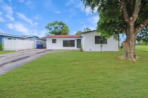 Photo of 1640 NW 27th Ave, Fort Lauderdale, FL 33311 (MLS # A11887518)