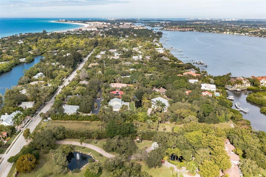 Two-acre+/ Lot on Little Sarasota Bay with exceptional privacy, views, boating access and development potential. This listing includes two contiguous buildable parcels (ID#s 0127030017 & 0127030018) offered together. This unique and visually stunning property with mature trees and lush landscaping includes a secluded bay offering protection of your lot and future dock from the elements and prying eyes. Its topography culminates in a substantially elevated waterfront pad which results in a livable ground floor. Approvals & permits for mangrove trimming and future dock are in place. Include a roof-top deck to enjoy Gulf of Mexico (ocean) views and spectacular daily sunsets! Stroll the key or ride the free Trolley to world famous Siesta Key or the many restaurants in the Village.