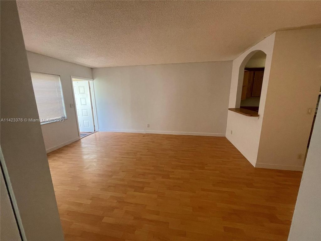 Photo of 812 Twin Lakes Dr #17-C, Coral Springs, FL 33071 (MLS # A11423376)