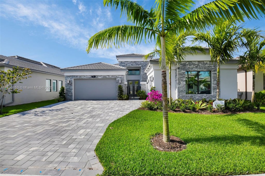Photo of 9808 Evergreen Woods Lane, Boynton Beach, FL 33473 (MLS # A11823653)