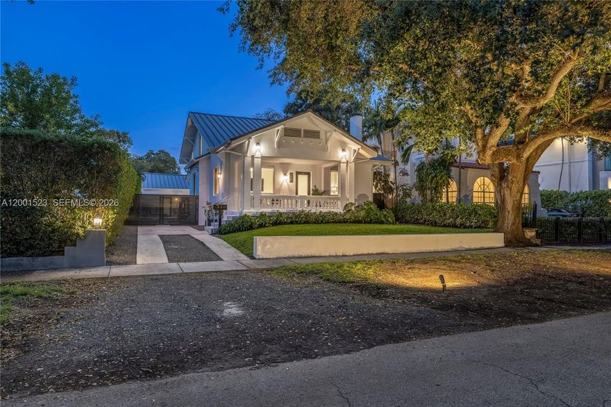 This one is special! Introducing Le Château, a fully reimagined 1925 estate in the lush enclave of El Portal—where historic architecture meets curated modern living. This rare offering includes a 4-bedroom, 3-bath main residence plus a detached 1-bedroom, 1-bath guest house, totaling 5 bedrooms and 4 baths across 3,300+ SF. A gracious front porch opens to grand interiors with soaring 10-foot ceilings, layered plasterwork, sculptural coffered details, and museum-quality crown moldings. Restored hardwood floors run throughout, anchored by a marble fireplace, with custom built-ins and a formal dining room creating an elegant yet inviting setting. The redesigned kitchen blends clean modern finishes with functionality while honoring the home’s architectural soul. The main level features a spa-like primary ensuite and an additional guest bedroom with full bath. Upstairs offers two bedrooms, a shared bath, and a charming loft retreat. Thoughtfully upgraded with impact windows and doors, metal roof, electrical, plumbing, and HVAC—this is a true turnkey residence. Outdoors, marble-clad patios and manicured grounds create a private setting with room for a pool. The detached guest house offers flexibility for guests, office, or income. Set beneath a majestic oak canopy in a non-flood zone on one of El Portal’s most picturesque streets—there is truly nothing else like it. 6 month minimum rental. Also for sale.