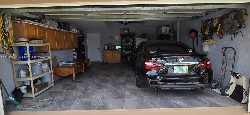 Photo of 1237 SW Malaga Ave, Port Saint Lucie, FL 34953 (MLS # A11649541)