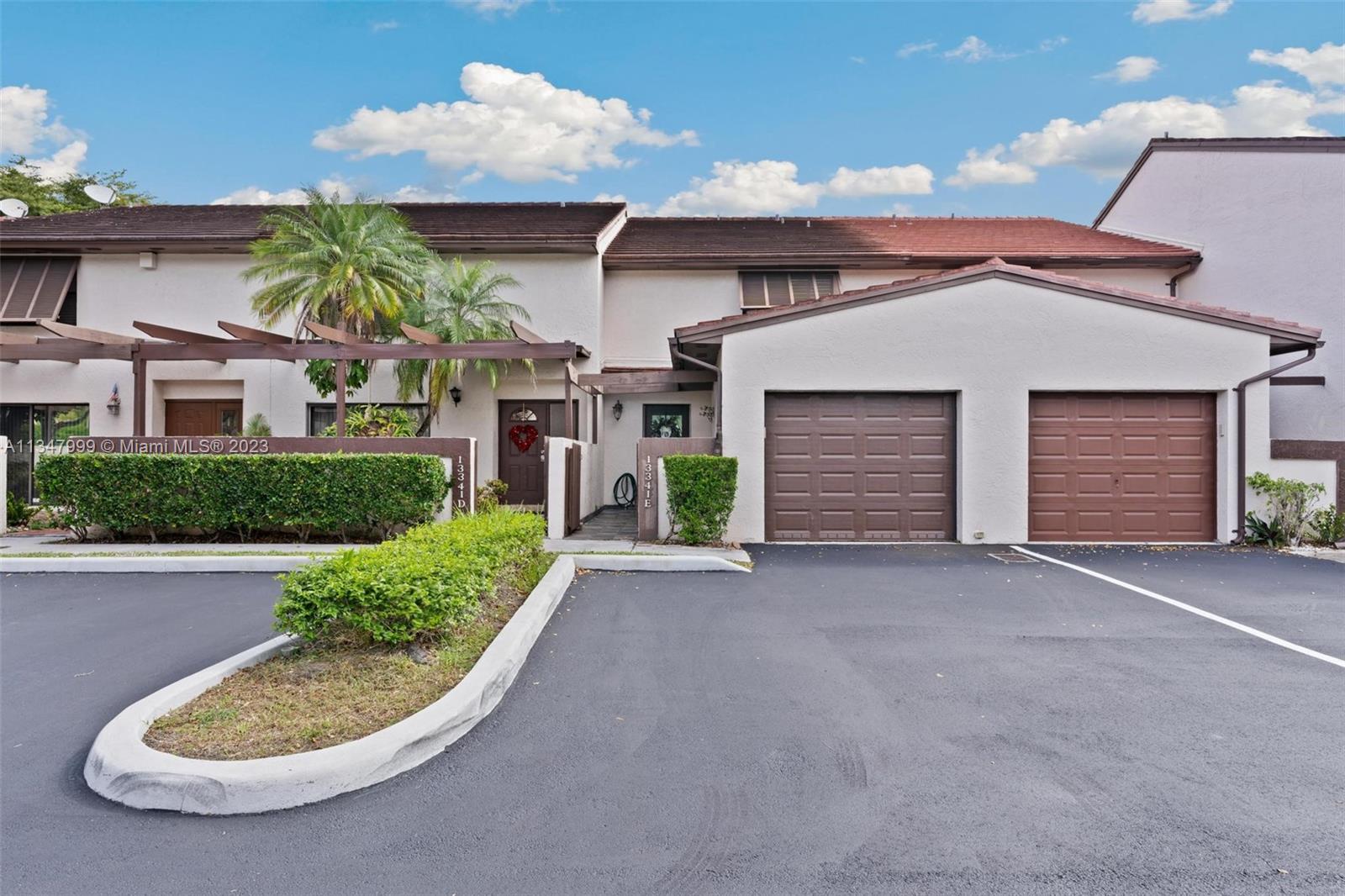 Photo 1 of 32 of 13341 SW 88th Ter E townhome