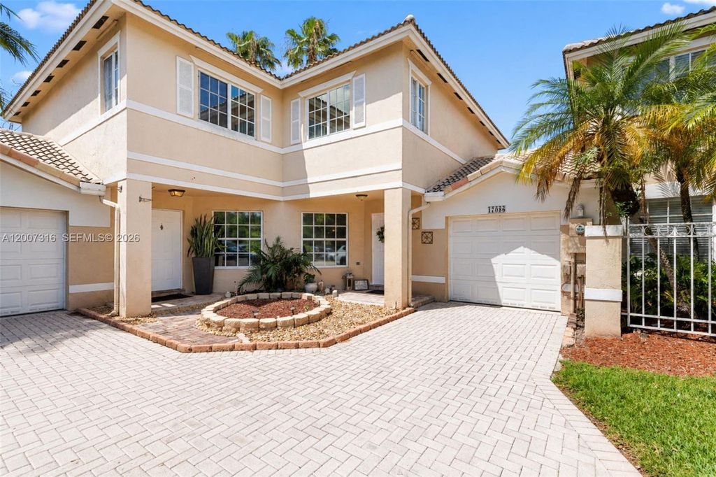 Photo of 17086 NW 22nd St, Pembroke Pines, FL 33028 (MLS # A12007316)