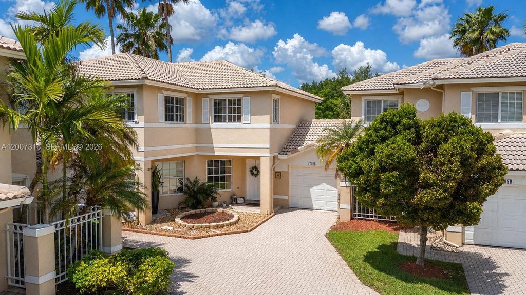 Photo of 17086 NW 22nd St, Pembroke Pines, FL 33028 (MLS # A12007316)