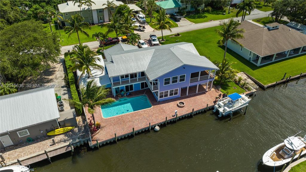 Photo of 474 Peninsula Dr, Fort Pierce, FL 34946 (MLS # A12015618)