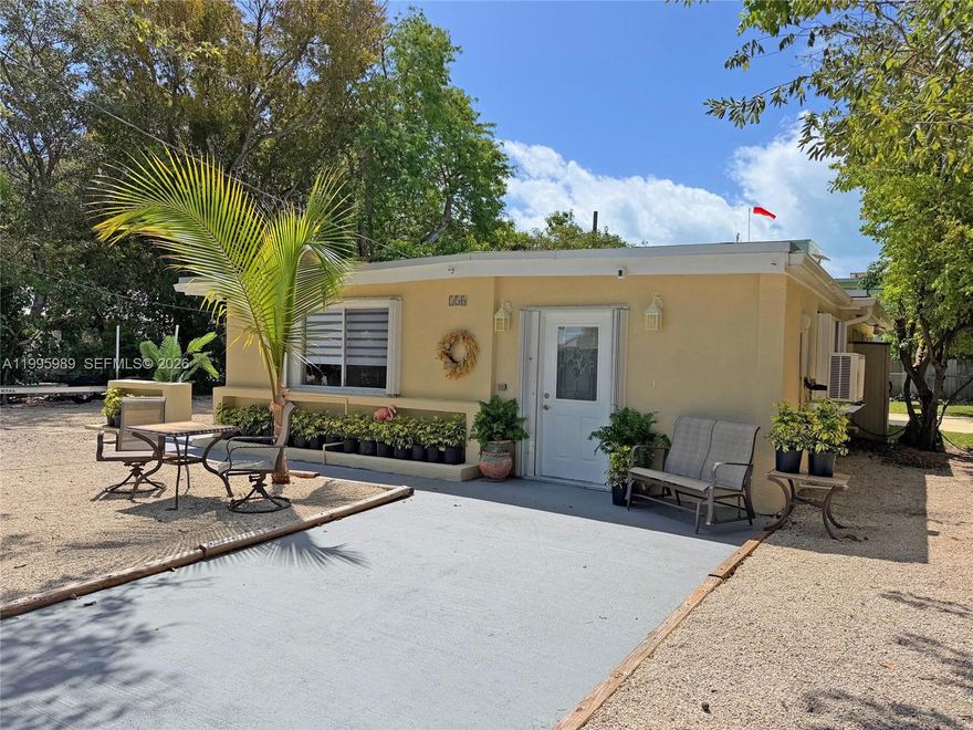 Relax and Revitalize in this Stylish Island Home! Move-In Ready! Much larger inside than it appears from the outside. Live the Florida Keys lifestyle in this 3-bedroom 2-bath home in desirable Edenaire Subdivision. Nestled in a prime location on 1-1/2 lots located in the X-Zone (highest elevation in the Florida Keys), this home offers modern upgrades, a new roof 2022, open floor plan, and coastal charm. Includes a variety of fruit and tropical trees such as Starfruit, Bahamian Cherry, Keit Mango, Jamaican Dogwood, Bismark Palm and more. Durable concrete construction for peace of mind. Excellent location with private neighborhood park with boat ramp and 72-hour dockage, trailer parking and picnic tables. Easy access to Bay or Ocean through Tavernier Creek. Close to shopping, schools, restaurants, and hospital. Delight in all the Florida Keys has to offer. This is an excellent home for living and working in the Keys or as investment property. Not a Drive by!!! ROOM FOR A POOL!!!
