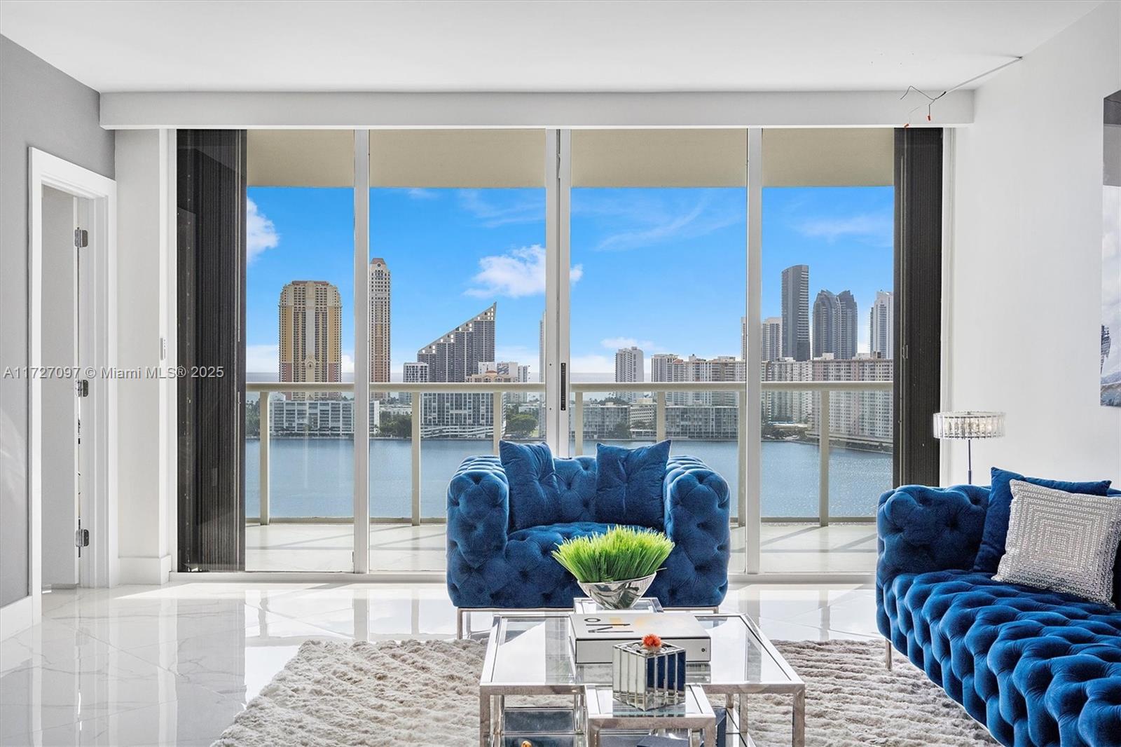 SPECTACULAR VIEWS OF OCEAN, BAY/INTERCOASTAL, AND MIAMI SKYLINE FROM THIS MODERN, RECENTLY RENOVATED 3 BEDROOM/ 3 BATH CORNER CONDO. NO EXPENSE SPARED IN RECENT EUROPEAN-STYLE RENOVATION. FLOW THROUGH UNIT WITH SUNRISE/SUNSET VIEWS FROM OVERSIZED BALCONIES; PERFECT FOR ENTERTAINING. WILLIAMS ISLAND HAS WORLD CLASS AMENITIES SUCH AS: 4 RESTAURANTS, MANY POOLS, BEST SPA IN AVENTURA, 18 TENNIS COURTS, 4 PICKLEBALL COURTS, AND MUCH MORE. CONDO CAN BE SOLD FURNISHED. INCREDIBLE OPPORTUNITY IN ONE OF THE BEST, MOST PRIVATE AND EXCLUSIVE GATED COMMUNITIES IN SOUTH FLORIDA.