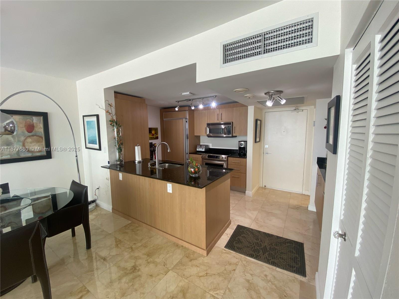 10275 Collins Ave 215