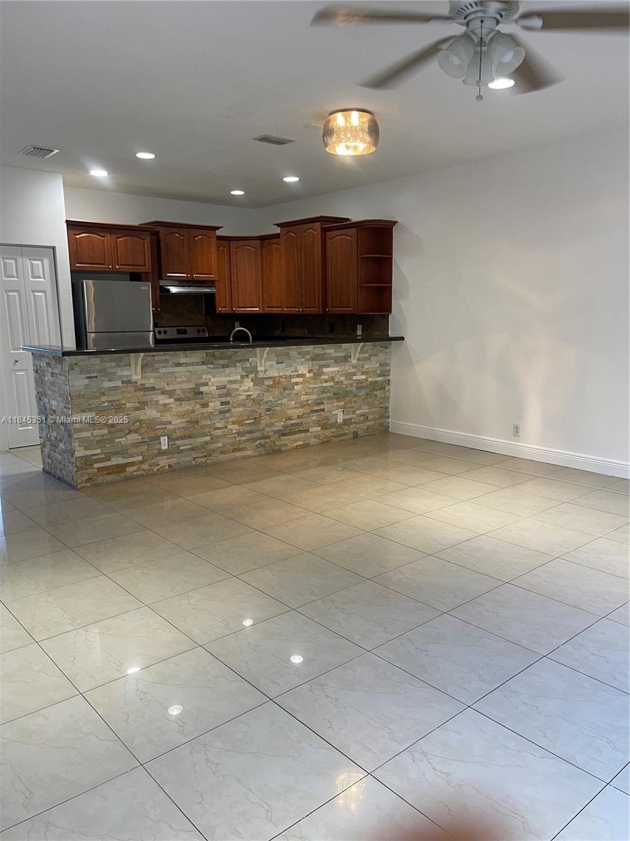 Welcome to this stunning 2-bedroom, 2.5 bathroom townhouse offering the perfect blend of comfort and convenience. This home features an in-unit washer and dryer, attached garage, and a spacious open layout filled with natural light. Step outside to a large backyard—ideal for outdoor dining, gardening, or simply unwinding. With no HOA and no restrictions, you’ll enjoy true flexibility and freedom. A rare opportunity you don’t want to miss!