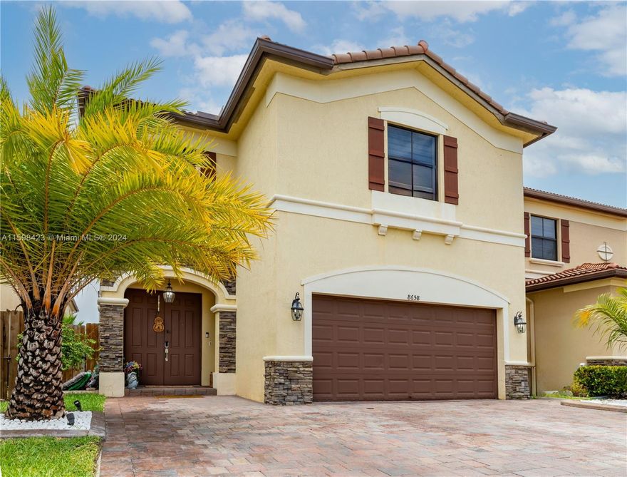 **MOTIVATED SELLER** THIS IS THE LOWEST PRICED 5-BED, 4-BATH HOME IN THE ISLES AT GRAND BAY DORAL AND ALL OFFERS WILL BE SERIOUSLY CONSIDERED. Discover this Two-Story, Single-Family Residence, featuring exquisite Spanish Mediterranean Architecture. Built in 2014, this home has been incredibly well maintained and upgraded. Boasting 5 Bedrooms, including a convenient ground-floor suite, and 4 full Bathrooms, this home offers Spacious living. Enjoy outdoor entertaining year-round under the sheltered patio, complete with a built-in Summer Kitchen. Nestled in a Gated Community with roaming security, you'll have access to a resort-style Clubhouse with a Pool, Gym, and Basketball Courts. Visit our Open House or schedule a Private Tour today!