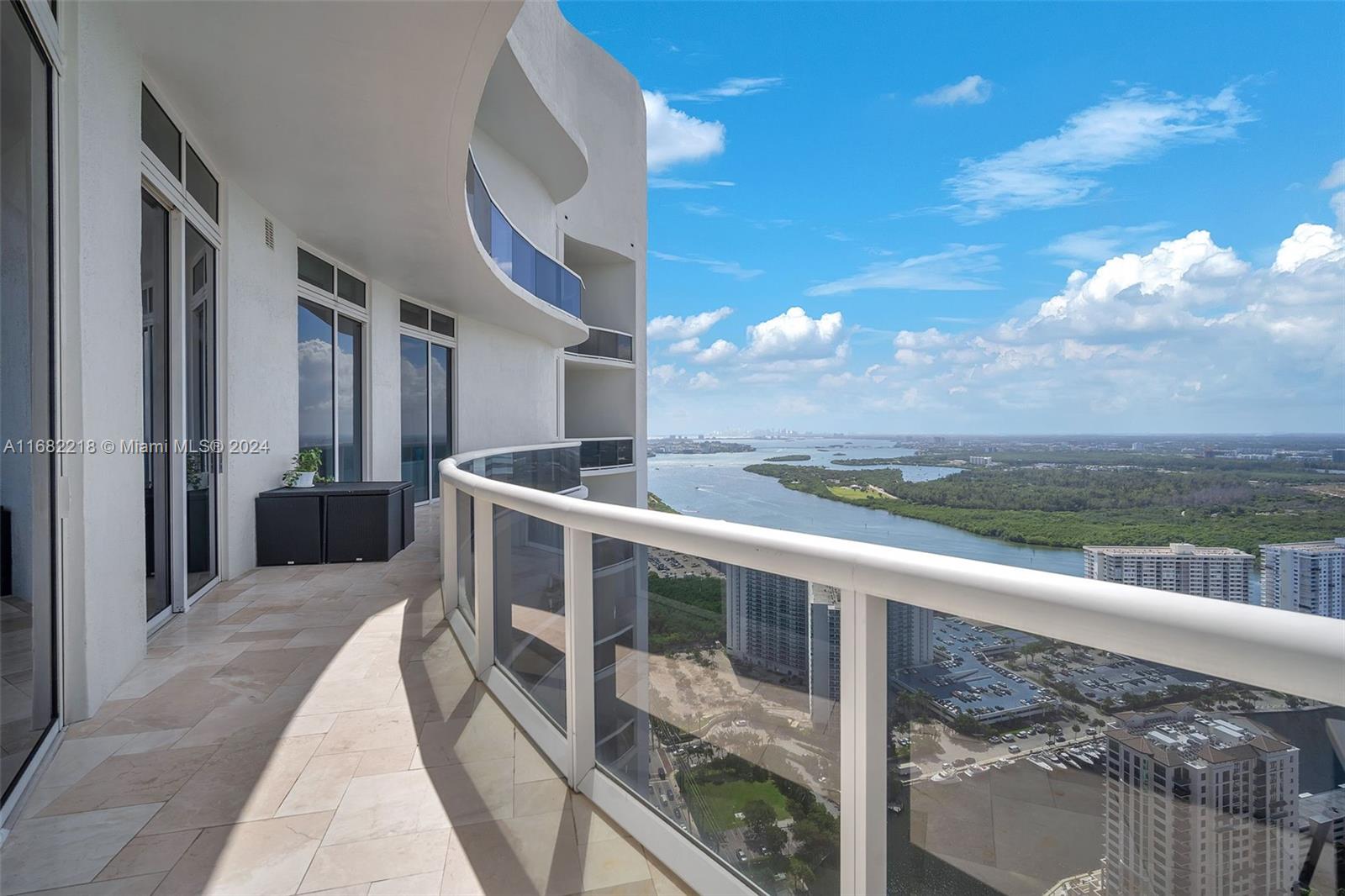 Welcome to Unit 4205, a breathtaking lower penthouse sanctuary in the sky. This exclusive residence offers absolute privacy, coupled with incredible unobstructed intracoastal views. With sprawling 12-foot ceilings. This 2-bed, 2 bath haven boasts the largest balcony in the building.
The interior features sleek, floor-to-ceiling windows provide breathtaking views and balcony access from every room, Bosch Appliances, built-in coffee machine, built-in water filter, brand-new Samsung washer/dryer and a Futuro Futuro Range Hood.
Residents enjoy unparalleled access to luxury amenities, state-of-the-art gym, valet parking, spa services, 24/7 security and concierge services and a beach club with private restaurant. The valet service fast, easy and powered by smart app technology.