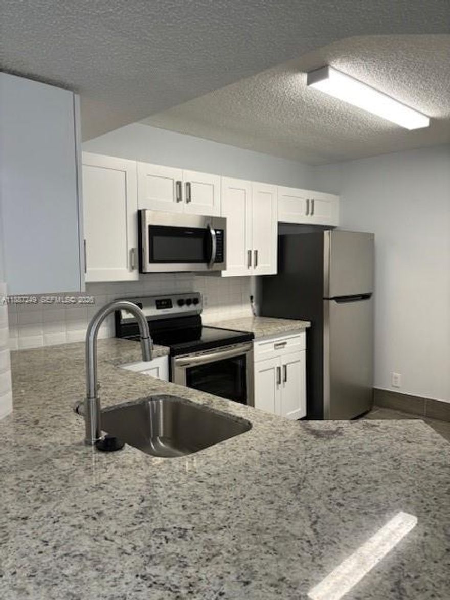 Completely remodeled first floor two bedroom two bath condo in Edgewater. Currently rented at $2200 until 2027. Perfect for investor. Investor-friendly community, OK to lease and corporate buyers welcome