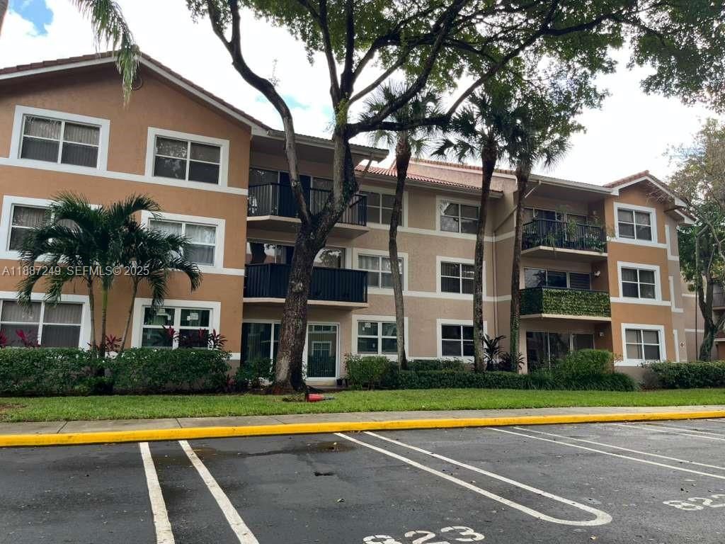 Photo of 8701 Wiles Rd #103, Coral Springs, FL 33067 (MLS # A11887249)