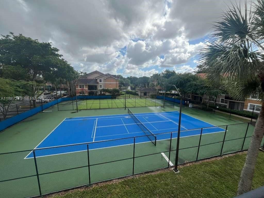 Photo of 8701 Wiles Rd #103, Coral Springs, FL 33067 (MLS # A11887249)