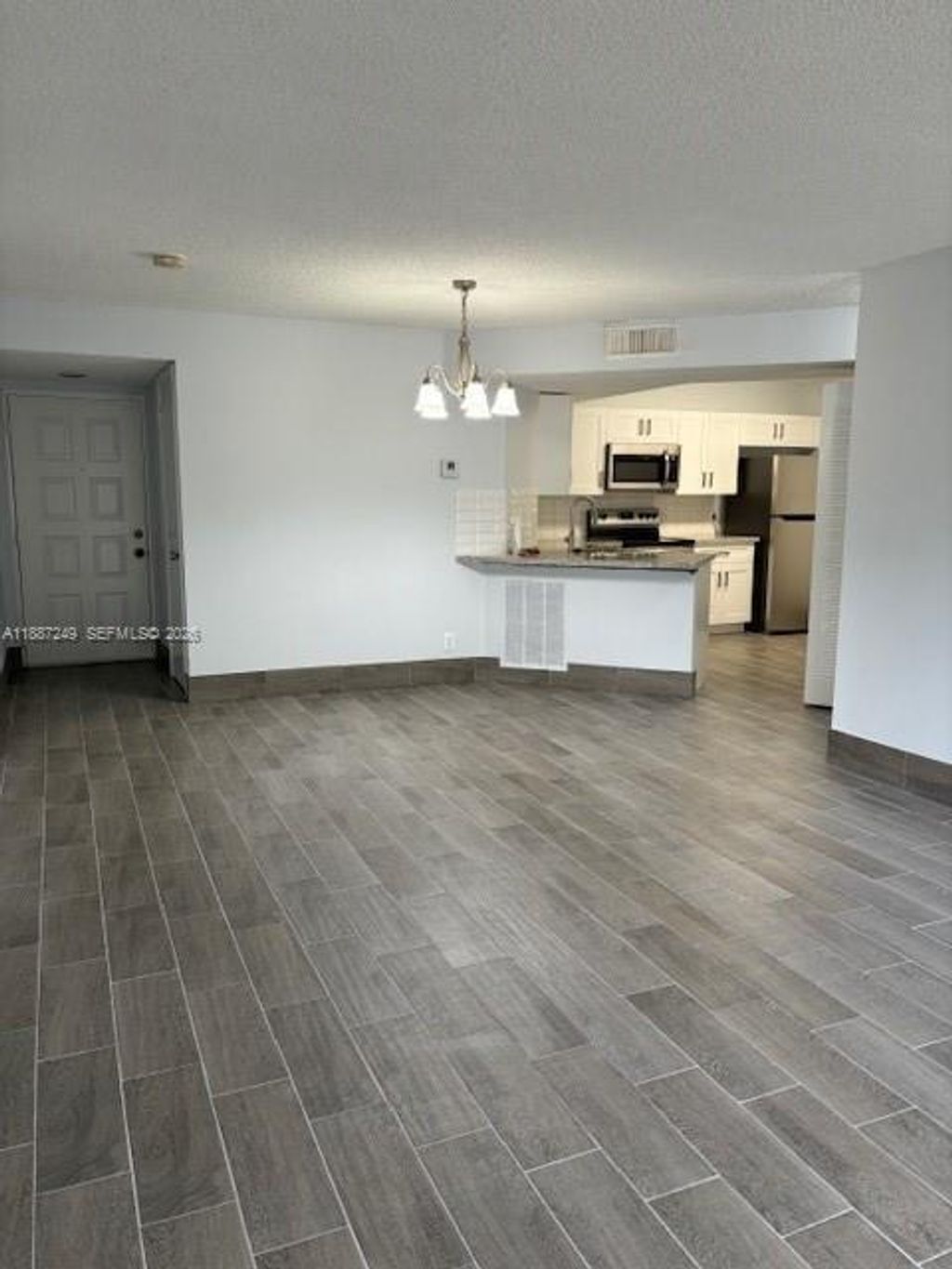 Photo of 8701 Wiles Rd #103, Coral Springs, FL 33067 (MLS # A11887249)