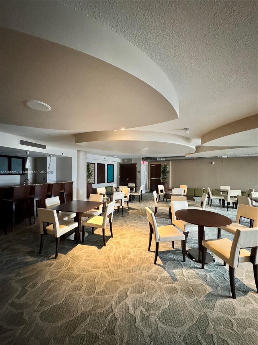 TAO SAWGRASS CONDOMINIUM - Residential