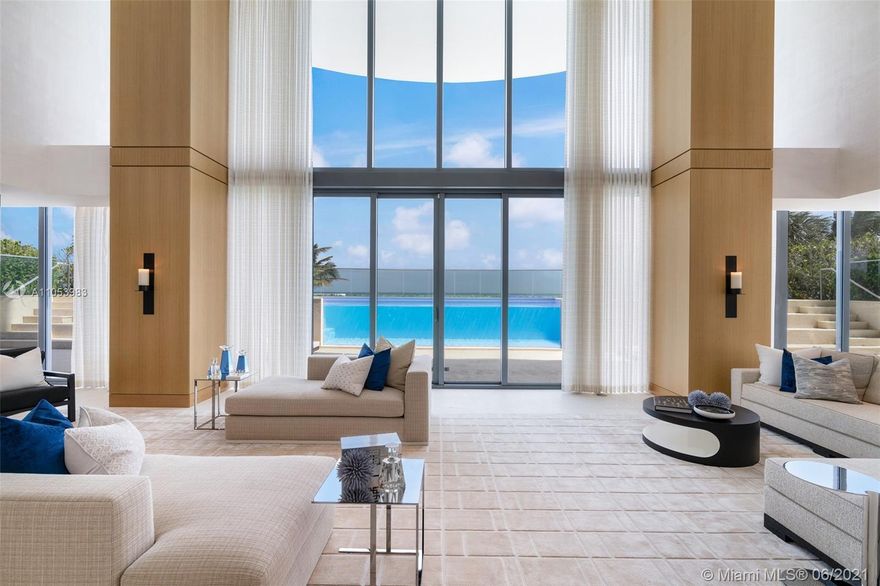 The Beach House at Regalia Sunny Isles is an oceanfront residence at the scale of a private home, with all the conveniences of an ultra-luxury condominium. The Beach House accommodates a variety of living and entertainment areas, from the double-height great room that opens onto the glass-walled oceanfront pool and hot tub, to the adjoining summer kitchen, the quartz and bronze cocktail bar, private spa with hammam steam room, chef’s kitchen with Wolf & Subzero appliances, and game room. The private areas of the home are just as special, with a guest living room, study, and massive master bathroom lined in floor-to-ceiling white onyx. Regalia offers a concierge, full-service spa, beach & pool, a private wine vault, business center, children's room, library, yoga studio & fitness center.
