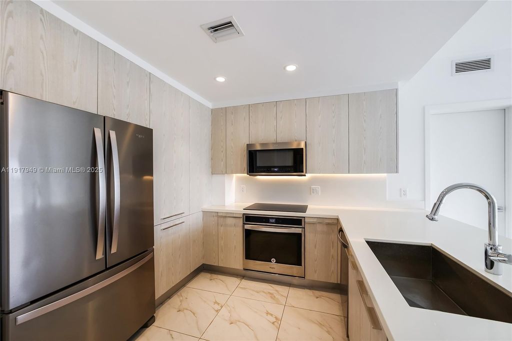 Photo of 2000 Metropica Way #306, Sunrise, FL 33323 (MLS # A11917949)