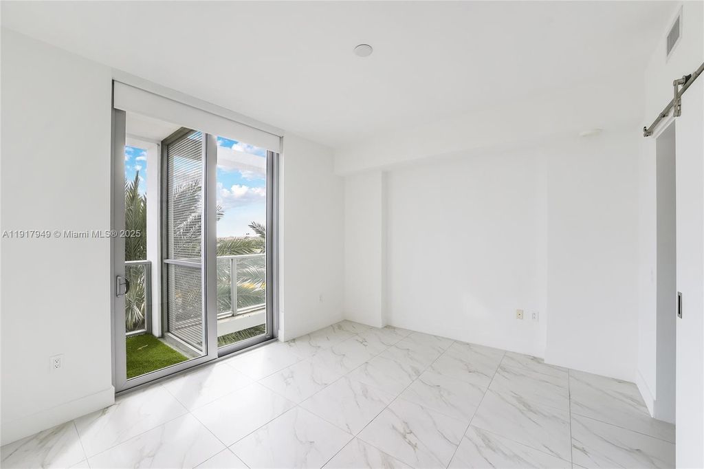 Photo of 2000 Metropica Way #306, Sunrise, FL 33323 (MLS # A11917949)