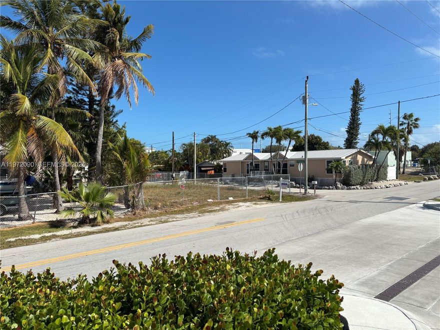 Seller Financing Available -- Prime Corner Lot with water views, in Marathon
This vacant, cleared corner lot sits in one of Marathon's most convenient and high-visibility locations. Directly across from Racetrac, the public library, Marathon High School, Fishermen's Hospital, Starbucks, mini golf, City Marina, the boat ramp, and the events park, this property offers unbeatable access to the best of the Middle Keys.
Whether you're looking to build, invest, or secure a strategic commercial or mixed-use opportunity, this lot places you at the center of Marathon's activity hub.
Seller financing makes this an even more accessible opportunity.
