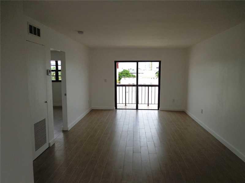 Totally renovated and sunny unit located just a 30 second stroll from Lincoln Road. No detail has been spared. Brand new kitchen with stainless steel appliances, black marble countertops, and custom cabinets. Luxurious master bathroom with glass enclosed rainfall shower. Half bath for guests. An LG stackable washer & dryer are included. Plenty of custom closets with built-ins. Recessed lighting in most rooms with dimmers. Unit includes one covered gated parking space.