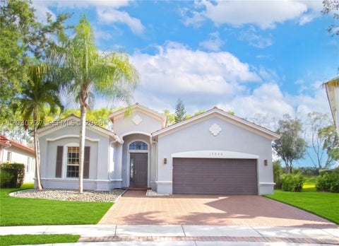 Photo of 19548 S Whitewater Ave, Weston, FL 33332 (MLS # A12030727)