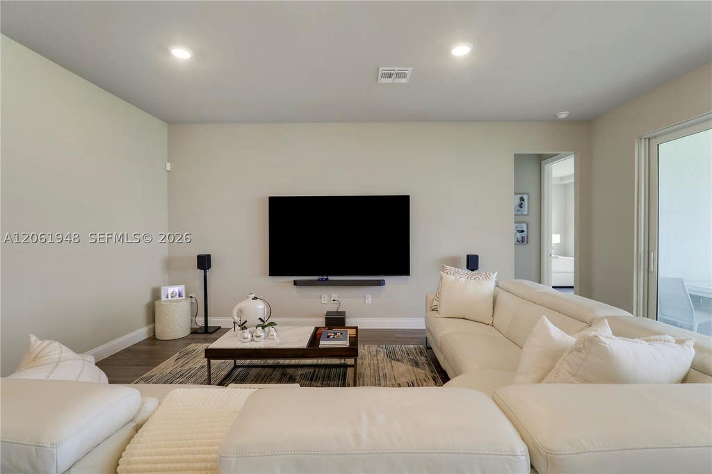 Photo of 6489 NW Cloverdale Ave, Port St Lucie, FL 34987 (MLS # A12061948)
