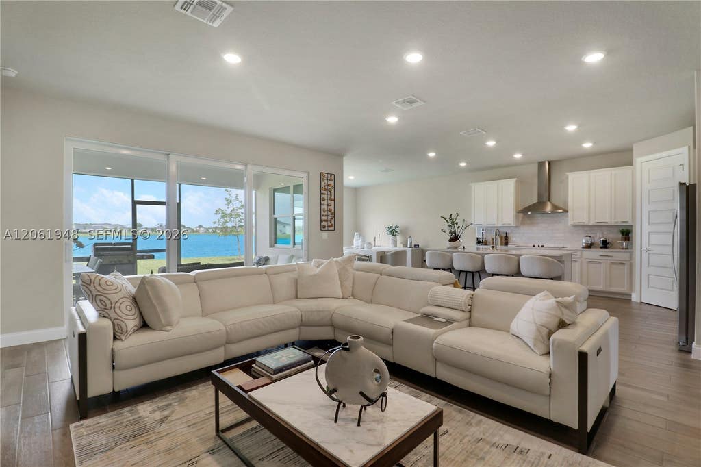 Photo of 6489 NW Cloverdale Ave, Port St Lucie, FL 34987 (MLS # A12061948)