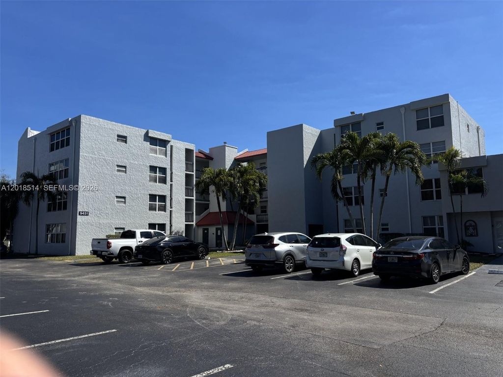 Photo of 9451 Evergreen Pl #102, Davie, FL 33324 (MLS # A12018514)