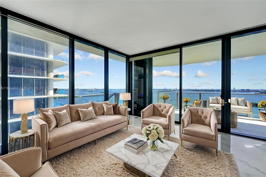 Price reduction for a quick sale!! Waterfront sophistication Residence 2901 is a luxury 4-bedroom + office, 5-bath, maid quaters with $100K in designer upgrades. Features include 2 parking spots, custom closets, blinds, and 2 private elevator access. Enjoy panoramic views of Biscayne Bay, the Atlantic and Miami's skyline through floor-to-ceiling windows. Each bedroom has a spa-style en-suite, and the den offers flexible use as an office, media room, or guest space.