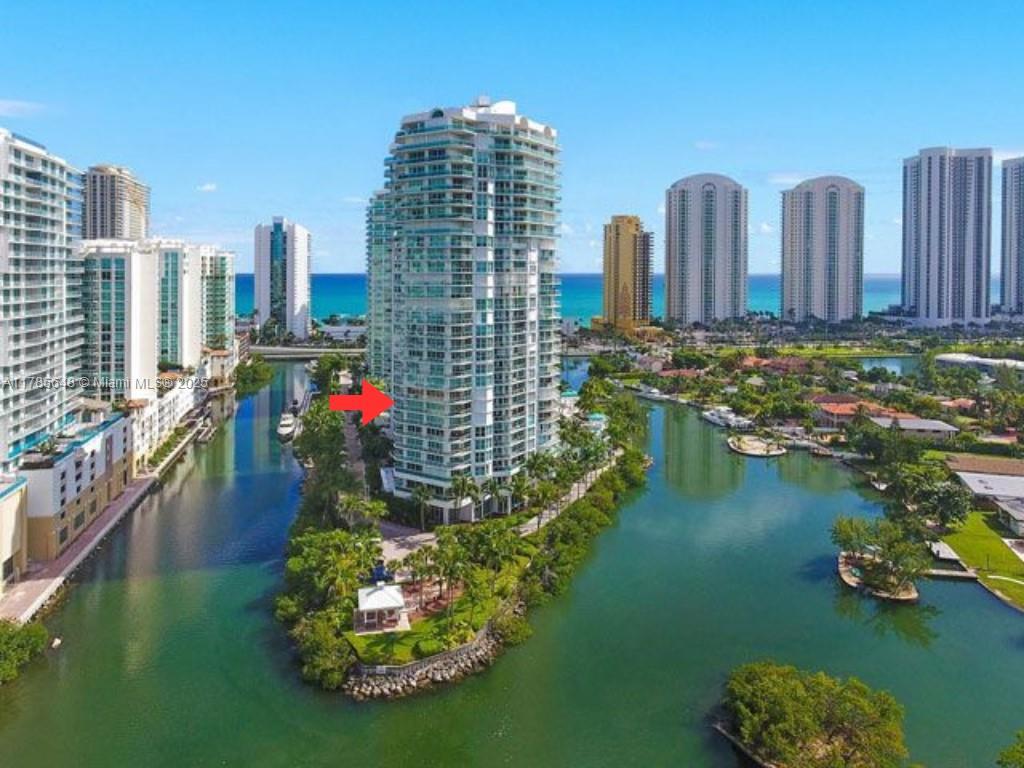 Video Tour is furnished & explains better. Best view in Oceania. Breathtaking sunsets, floor-to-ceiling glass, abundant natural light define this stunning residence. Oversized wraparound balcony w/panoramic views of Oleta Park, bay, & canal—close & unobstructed from the 6th floor. Split floor plan ensures privacy, with the master suite enjoying private balcony access & the best view. Wide hallway, 36” tiles, wood floors in bedrooms, & a spacious layout add to the elegance. Kitchen includes a dining area; the living room features formal dining. Oceania V is the newest tower, with beach club access: luxury gym, fitness classes, racquetball, beachfront dining, tiki bar, spa, salon, & full beach service. Building offers pool, gym, tennis, party room—& dock space may be available for purchase.
