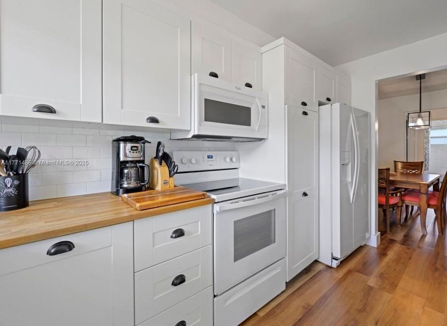 Discover this recently renovated and charming first-floor apartment, featuring hurricane windows for added safety and peace of mind. Enjoy the convenience of an assigned parking space located directly in front of your home. Situated in a prime location just minutes from the beach, top-rated restaurants, schools, shopping centers—including Aventura Mall—and major roads, this apartment offers the perfect blend of comfort and accessibility. Community amenities include a heated pool and BBQ area, ideal for relaxation and entertainment. With a brand-new roof and easy showings, this is an exceptional opportunity to own a beautiful home. The association fee covers operating expenses, reserves, water, trash collection, and the care and maintenance of all community amenities.