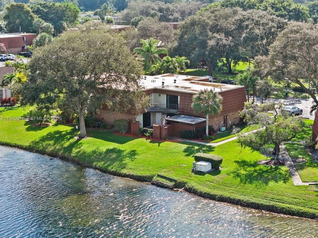 Photo of 11875 SW 12th Pl, Davie, FL 33325 (MLS # A11949916)