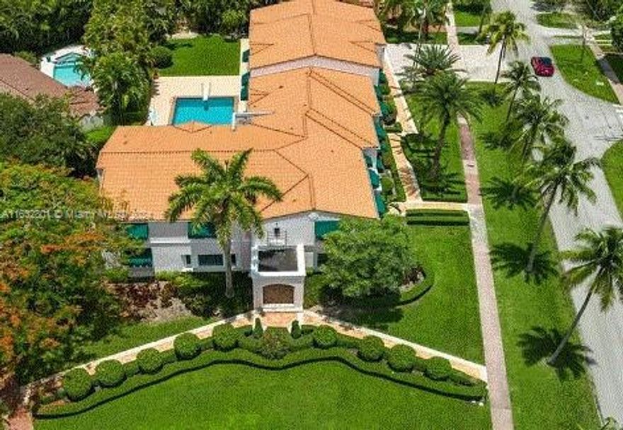 Sophisticated 12,327 SF estate in Coral Gables with 7 bedrooms, 8 bathrooms, and 2 half-bathrooms on a 31,529 SF lot. Features a grand foyer, open layout, custom details, two formal dining areas, and a gourmet kitchen with top-tier appliances. Includes a luxurious primary suite, office/library, game room, and elevator. Stunning outdoor spaces with palm trees, manicured grounds, and a large pool with a new heater. Ample parking with a 3-car garage and driveway; new roof and AC units from 2019. Close to fine dining, upscale shopping, and entertainment.
Photos coming soon.