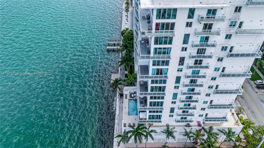 15-Unit Waterfront Building for sale in the Heart of the Bay, North Bay Village. This modern architectural gem offers 15 two-story units, crowned by a spectacular penthouse boasting unobstructed panoramic views of Biscayne Bay and Miami Beach. Each unit has 20 foot ceilings, floor-to ceiling windows, and DIRECT water views! Amidst a wave of new construction, including what is rumored to be a Ritz Carlton Residences coming next door, North Bay Village is set to emerge as one of the most desirable locations as a three island community positioned between Miami and Miami Beach.
