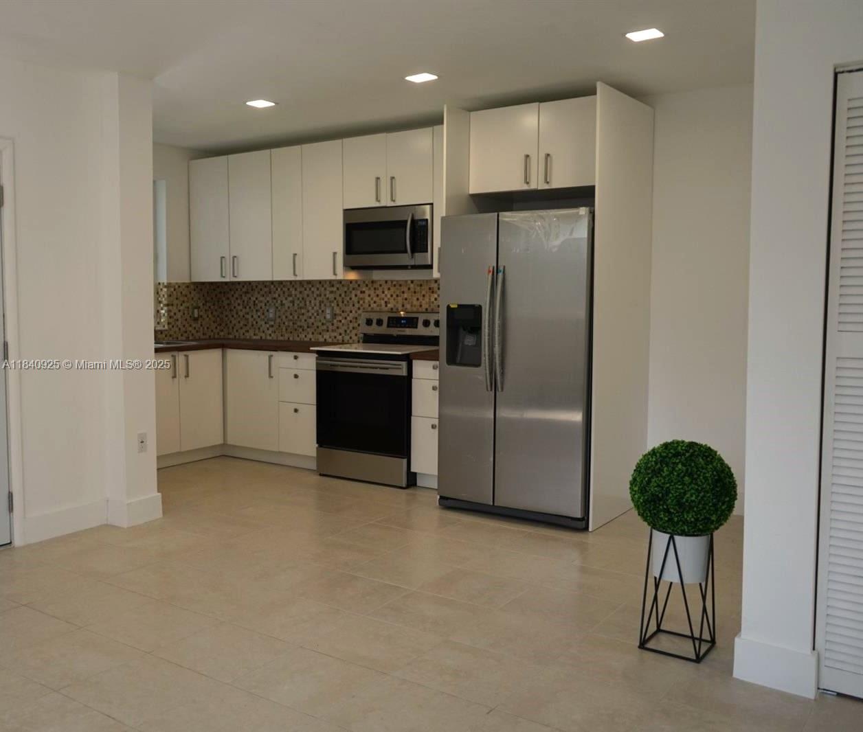 House available for rent in North Miami with three bedrooms and two bathrooms, ready for a family to move in. New construction, with appliances that are one year old. Equal Housing Opportunity.