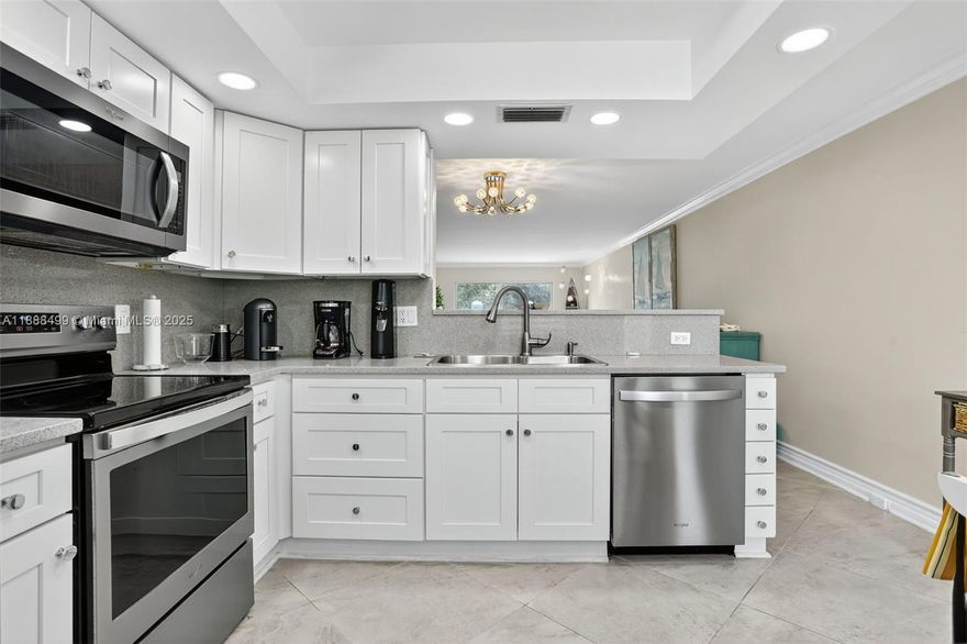 TOP OF THE LINE UNIT !!!! 2 BEDROOM 2 BATHS CONDO WITH NEW A.C 2024 ! NEW ELECTRICAL PANEL 2021! NEW WATER HEATER 20201!!! QUARTZ COUNTERTOP IN OPEN KITCHEN AND IN BATHROOMS! UNIT COMES FULLY FURNISHED WITH LUXURIOUS NEW FURNITURE AND TOP QUALITY BEDDING AND KITCHENWARE. DONT MISS THIS BEAUTIFUL CONDO ON THE 3RD FLOOR JUST BRING YOUR TOOTBRUSH RESORT STYLE AMENITIES : GOLF COURSE TENNIS PICKLEBALL HEATED POOL AND JACUZZI THEATER AND SOCIAL CLUBS WALKING TRAILS COURTESY BUS  MINUTES FROM SHOPPING, DINING AND BEACHES!!! MOVE IN READY!!!