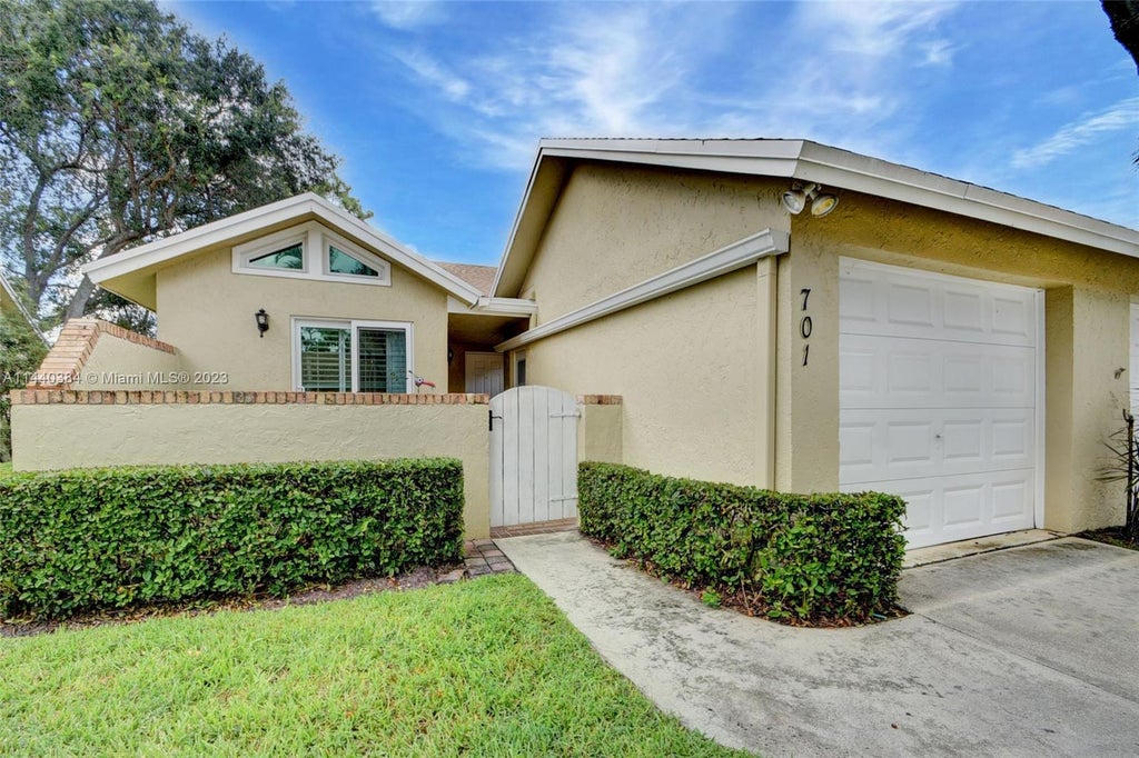 Photo of 701 Maplewood Dr, Green Acres, FL 33415 (MLS # A11440384)