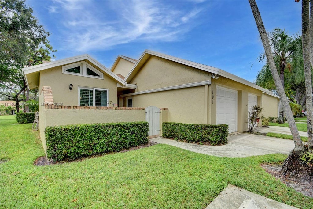 Photo of 701 Maplewood Dr, Green Acres, FL 33415 (MLS # A11440384)