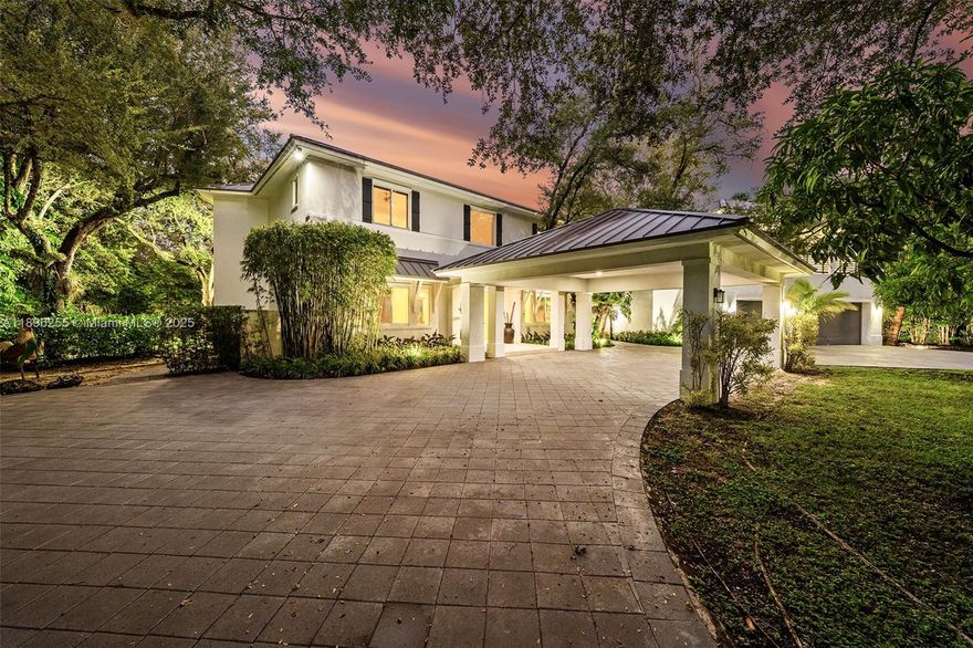 North Pinecrest Estate on a sprawling 48,717 sf lot. This elegant 7 bed, 7.5  bath residence offers a unique floorplan distribution with two separate bedroom wings ideal for an extended family or visiting guests. The east wing encompasses a luxurious primary bedroom & bath w/ spacious closets plus 3 generous bdrms w/ on-suite baths. The west wing/in law/guest quarters offers a spacious (1,000 sf) 2 bdrms, 1 bath & it's own family room & kitchen area with separate entrance.  Other features include an oversized modern kitchen open to family room & outdoor patio perfect for entertaining, secure & gated entrance w/ oversized circular drive, porte-cochere for 4 cars , 3 car garage w/11 ft ceilings ideal for 3 sport car lifts, 1,400 bottle temp. controlled wine room, owner financing available.