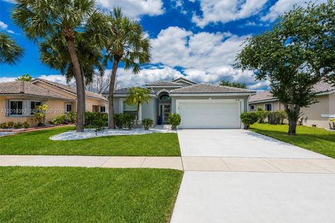 Photo of 214 SW 180th Ave, Pembroke Pines, FL 33029 (MLS # A12010392)