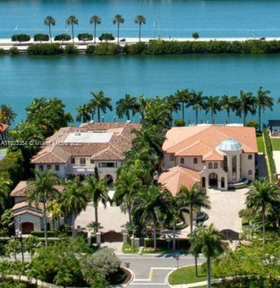 Introducing 198 & 190 Palm Ave, featuring 24,036 gated interior sqft on a 60,000 sqft lot with 200 linear feet on the water with multiple docks for yachts. The compound includes two mansions side-by-side, and gives full flexibility with room for staff, guests and security. Meticulously designed with the highest quality materials and an unwavering commitment to detail. With a grand total of 15 bedrooms, 17 full + 5 half bathrooms, 2 swimming pools, lush gardens and docks for multiple mega yachts. Every space is a testament to luxury; it’s a lifestyle of unparalleled elegance and refinement. Seize this rare opportunity to own the most private and secure paradise on Palm Island.